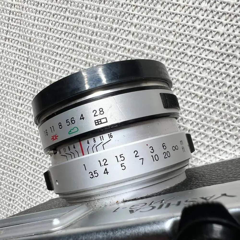 Yashica MG-1 35mm Rangefinder Film Camera 45mm f/2.8 Lens Made in‎ Hong Kong Cap